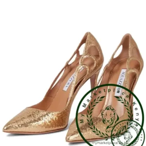 Aquazurra's signature Fenix pumps receive a glamourous makeover in golden nappa leather. Aquazzura Fenix 105 leather pumps